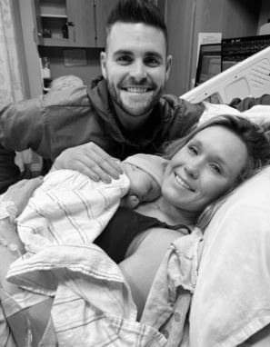 Sonnie Brand with her husband David Boudia and newly born baby Parker Rae.